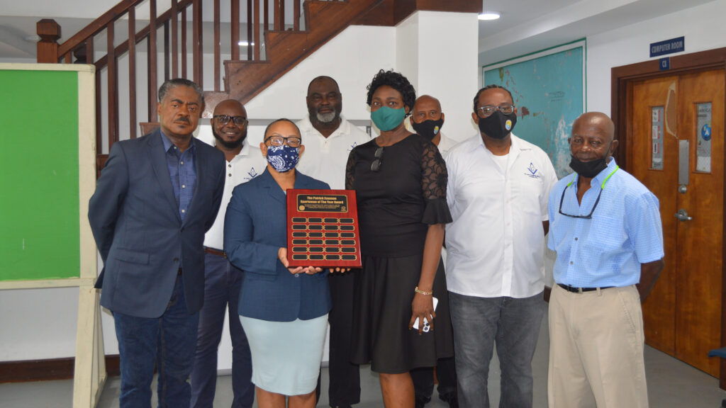 Antigua - Freemasons make donation to AGS in honour of deceased brother