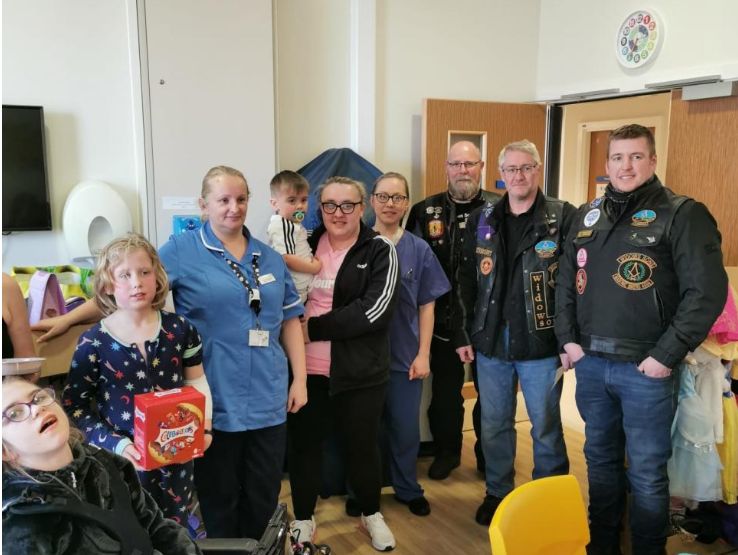 Cumbria/England - Motorcycling Freemasons hand out Easter eggs to children