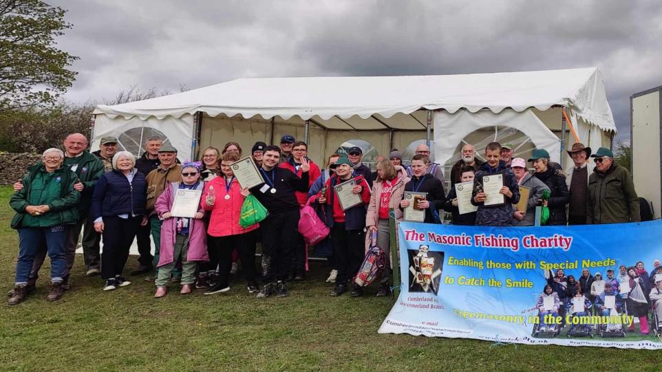 Cumbria/England - Children with special needs join Freemasons for fishing event